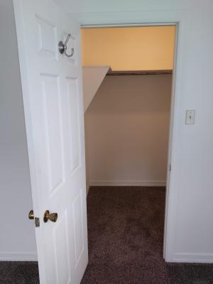 Walk-in closet in the larger Bedroom